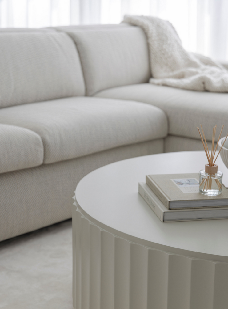 
                  
                    Close up of Adderlay coffee table and it's fluted edge.
                  
                