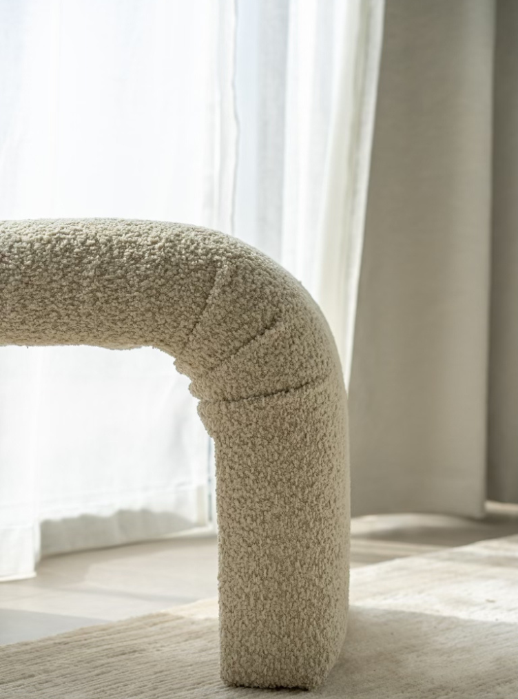 
                  
                    Archer Ottoman in Beige Teddy fabric under console table.
                  
                